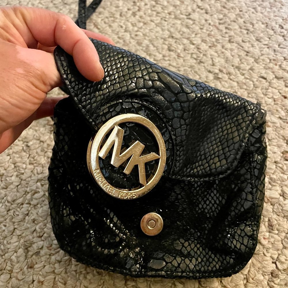 Crossbody Michael Kors bag embossed with snake print